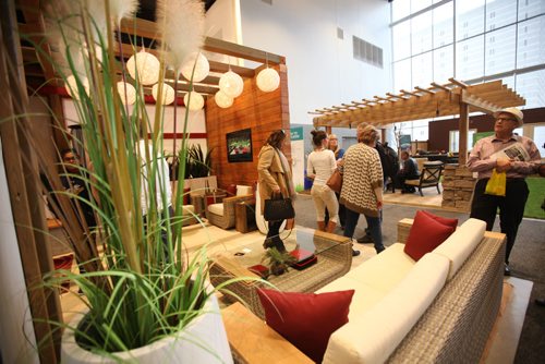 RUTH / BONNEVILLE WINNIPEG FREE PRESS

People check out the display by B. Rocke Landscaping  and design  at the Winnipeg Home & Garden Show Saturday.  
Standup photo


April 8, 2017