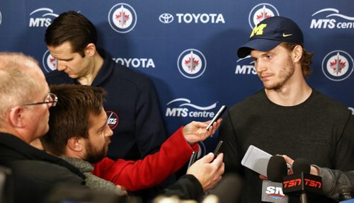 MIKE DEAL / WINNIPEG FREE PRESS
Winnipeg Jets defenceman Jacob Trouba is interviewed by the media the day after the teams last game of the season. 
170409
Sunday, April 09, 2017