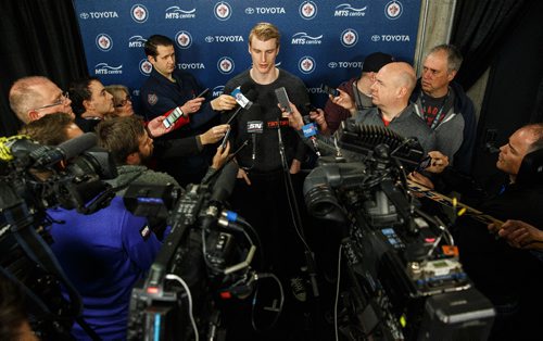 MIKE DEAL / WINNIPEG FREE PRESS
Winnipeg Jets defenceman Tyler Myers is interviewed by the media the day after the teams last game of the season. 170409 - Sunday, April 09, 2017.