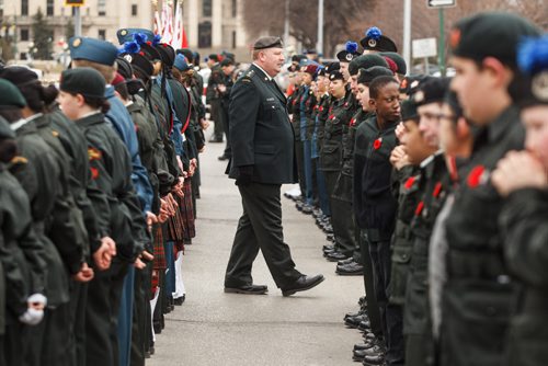 MIKE DEAL / WINNIPEG FREE PRESS
Lieutenant Blair Will of the 407 Royal Canadian Army Cadet Corps. keeps an eye on the cadets during the memorial celebration of the 100th Anniversary of the Battle of Vimy Ridge at the memorial cenotaph on Memorial Boulevard on Sunday afternoon.
170409 - Sunday, April 09, 2017.