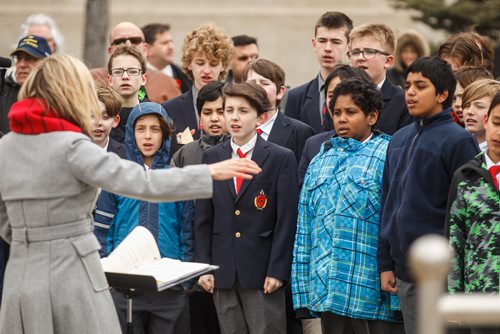 MIKE DEAL / WINNIPEG FREE PRESS
The Winnipeg Boys' Choir sings during the memorial celebration of the 100th Anniversary of the Battle of Vimy Ridge at the memorial cenotaph on Memorial Boulevard on Sunday afternoon.
170409 - Sunday, April 09, 2017.