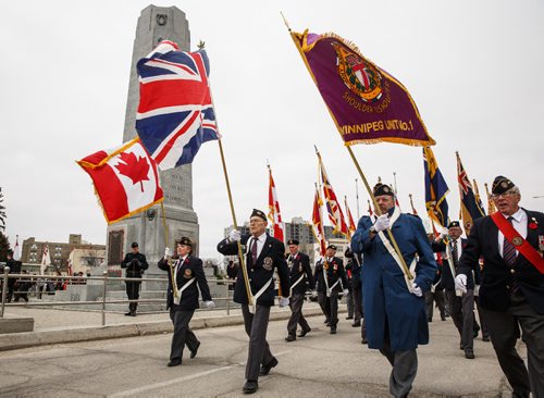 MIKE DEAL / WINNIPEG FREE PRESS
Veterans march past the cenotaph during the memorial celebration of the 100th Anniversary of the Battle of Vimy Ridge at the memorial cenotaph on Memorial Boulevard on Sunday afternoon.
170409 - Sunday, April 09, 2017.