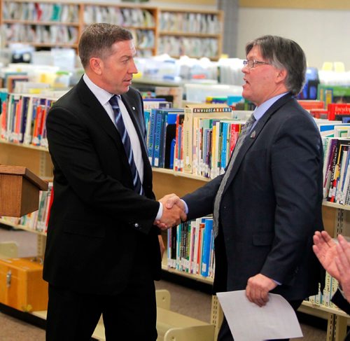 BORIS MINKEVICH / WINNIPEG FREE PRESS
From left, Sheldon Kennedy, founder, Respect Group Inc. and Education and Training Minister Ian Wishart shake hands after the funding announcement. The event was held at the Educational Resource Centre, Bernie Wolfe Community School, 95 Bournais Dr. in Transcona.  Funding and support for the Respect in School Program. April 10, 2017