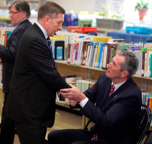 BORIS MINKEVICH / WINNIPEG FREE PRESS
From left, Sheldon Kennedy, founder, Respect Group Inc. and Premier Brian Pallister shake hands after the funding announcement. The event was held at the Educational Resource Centre, Bernie Wolfe Community School, 95 Bournais Dr. in Transcona.  Funding and support for the Respect in School Program. April 10, 2017