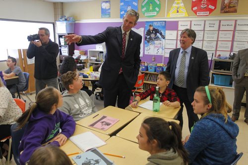 BORIS MINKEVICH / WINNIPEG FREE PRESS
Standing and pointing, Premier Brian Pallister and, right standing, Education and Training Minister Ian Wishart visit with the kids in a grade 7 class at Bernie Wolfe Community School after the Respect in School Program funding announcement. April 10, 2017