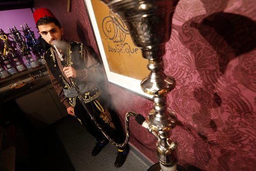 JOHN WOODS / WINNIPEG FREE PRESS
Mohammed Huri smokes a hookah at Arabesque Hookah Cafe and Restaurant in Winnipeg Sunday, April 9, 2017.