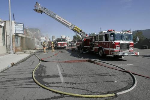 John Woods / Winnipeg Free Press / August 9, 2008 - 080809  - Winnipeg firefighters tackle a fire at 593 - 597 Notre Dame this afternoon Saturday, August 9, 2008.