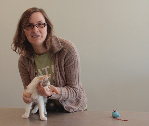 Canstar Community News April 3, 2017 - Jessica Thompson, CARE Cat Community Outreach worker, and Eowyn, a Winnipeg Humane Society cat. Thompson works out of CARE's 1051 Main Street location, connecting cat owners in the North End, Elmwood, and Transcona with affordable spay and neutering. (SHELDON BIRNIE/CANSTAR/THE HERALD)