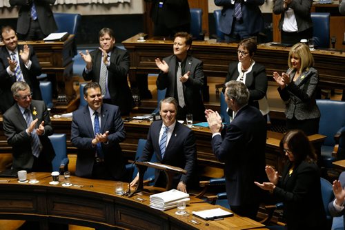 WAYNE GLOWACKI / WINNIPEG FREE PRESS

Finance Minister Cameron Friesen, centre, gets a standing ovation from his party after he delivered the budget in the Manitoba Legislature Tuesday.¤Larry Kusch/ Nick Martin stories  April 11     2017