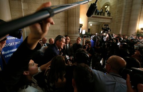 WAYNE GLOWACKI / WINNIPEG FREE PRESS

Premier Brian Pallister in centre, speaks with media after the budget was delivered in the Manitoba Legislature Tuesday.¤
Larry Kusch/ Nick Martin stories  April 11     2017