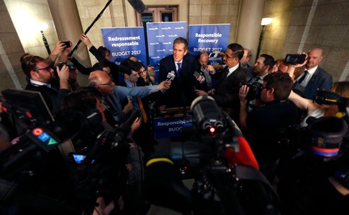 WAYNE GLOWACKI / WINNIPEG FREE PRESS

Premier Brian Pallister with media after the budget was delivered in the Manitoba Legislature Tuesday.¤
Larry Kusch/ Nick Martin stories  April 11     2017