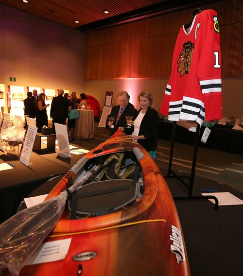 JASON HALSTEAD / WINNIPEG FREE PRESS

Attendees check out auction items at the Misericordia Gala at the RBC Convention Centre Winnipeg, on April 8, 2017. (See Social Page)