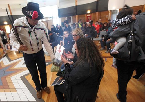PHIL HOSSACK / WINNIPEG FREE PRESS  - Melinda Wood smudges at her daughter Christine's vigil in Thunderbird House Wednesday. ....See Carol's story.  -  April 12, 2017