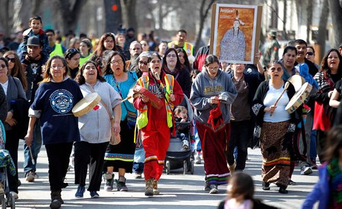 PHIL HOSSACK / WINNIPEG FREE PRESS  - Women sing and drum along Burrows ave near the scene of Christine Wood's murder Wednesday during a vigil and March. ....See Carol's story.  -  April 12, 2017