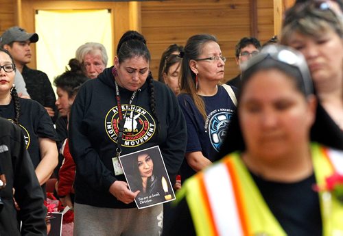 PHIL HOSSACK / WINNIPEG FREE PRESS  - A member of the American Indian Movement (AIM) holds a portrait of Christine Wood at her vigil in Thunderbird House Wednesday. ....See Carol's story.  -  April 12, 2017