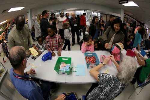 TREVOR HAGAN / WINNIPEG FREE PRESS
Children collect their chocolate following an Easter Egg hunt at the Royal Aviation Museum of Western Canada, Sunday, April 16, 2017.
