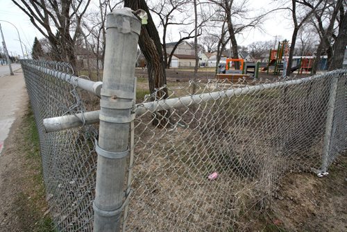 WAYNE GLOWACKI / WINNIPEG FREE PRESS

Fence damage at the King Edward Playground at King Edward St. and Ness Ave.  Aldo Santin  story April 17 2017