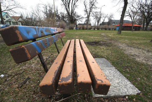 WAYNE GLOWACKI / WINNIPEG FREE PRESS

A park bench in the Weston Park along Logan Ave.    Aldo Santin  story April 17 2017