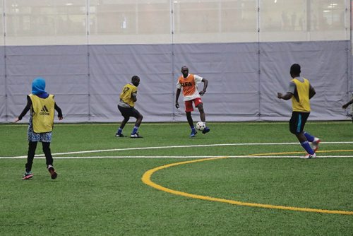 Canstar Community News Refugees and National Leasing employees get together for a soccer friendly tournament on April 8, 2017.