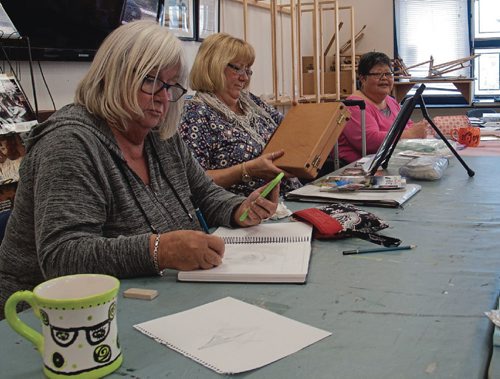 Canstar Community News Members of the Local Colour Art Group are preparing for the bi-annual art show, which takes place at the Elmwood EK Active Living Centre (180 Poplar Ave.) May 5-7. Money raised from the group's art raffle will go towards Lord Selkirk School's Roots & Shoots program. (SHELDON BIRNIE/CANSTAR/THE HERALD).