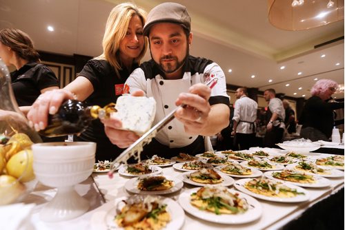 JOHN WOODS / WINNIPEG FREE PRESS
Mari Lena, special events and catering at Mona Lisa, and chef Angelo Anania prepare Pera Primavera at the Taste Of The Nation for No Kid Hungry 2017 fundraising event at the Fairmont Monday, April 17, 2017.