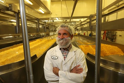 RUTH BONNEVILLE /  WINNIPEG FREE PRESS

Biz: Bothwell Cheese, Main St. N, New Bothwell, Mb. 
Bothwell Cheese company president KEVIN THOMSON in plant in New Bothwell.  Story is about how they have a new line of non-GMO-verified white cheddar cheese they have produced that will be hitting the store shelves later this summer.
April 18, 2017