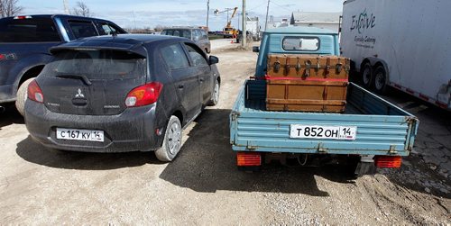 PHIL HOSSACK / WINNIPEG FREE PRESS  -  Vehicles prepped for scenes in the movie Siberia wait off set for their scene in Marquette Manitoba Tuesday. See Alex Paul story.  -  April 18,  2017