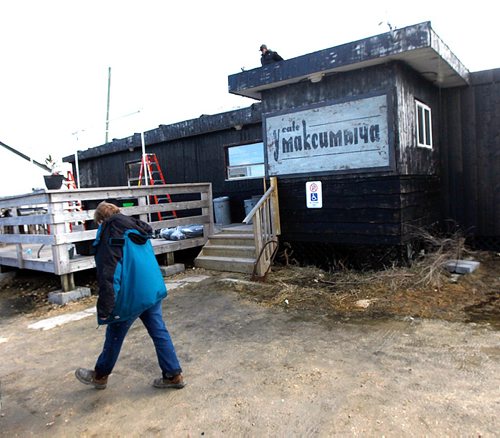 PHIL HOSSACK / WINNIPEG FREE PRESS  -  "Siberia" movie crew members prep the local eatery with a small addition and new Russian sign in Marquette Manitoba Tuesday. See Alex Paul story.  -  April 18,  2017