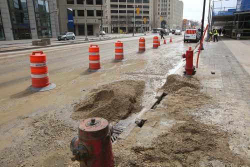 WAYNE GLOWACKI / WINNIPEG FREE PRESS

One lane on Main Street near Portage Ave. was still closed to traffic at noon Tuesday after the area was flooded with water earlier.  April 20 2017