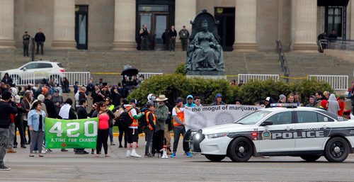 BORIS MINKEVICH / WINNIPEG FREE PRESS
420 celebrations at the Legislative Building grounds. A parade of a small group of people escorted by police. The route was from the leg to the Canadian Museum of Human Rights and back. April 20, 2017