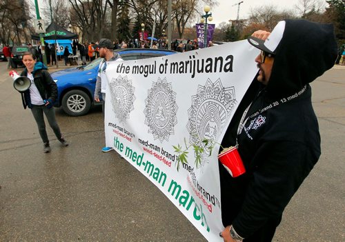 BORIS MINKEVICH / WINNIPEG FREE PRESS
420 celebrations at the Legislative Building grounds. A parade of a small group of people escorted by police. The route was from the leg to the Canadian Museum of Human Rights and back. April 20, 2017