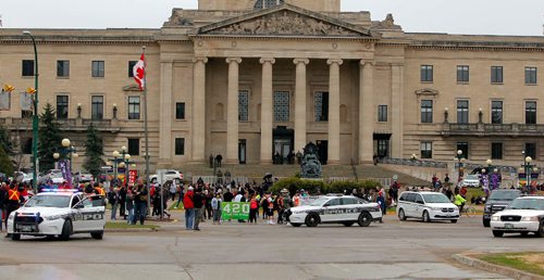 BORIS MINKEVICH / WINNIPEG FREE PRESS
420 celebrations at the Legislative Building grounds. A parade of a small group of people escorted by police. The route was from the leg to the Canadian Museum of Human Rights and back. April 20, 2017