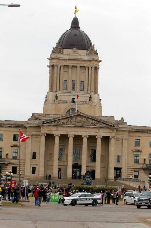 BORIS MINKEVICH / WINNIPEG FREE PRESS
420 celebrations at the Legislative Building grounds. A parade of a small group of people escorted by police. The route was from the leg to the Canadian Museum of Human Rights and back. April 20, 2017