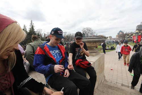 RUTH BONNEVILLE /  WINNIPEG FREE PRESS

People gather at the Manitoba Legislative grounds to celebrate 4/20 and smoke pot (cannabis, marihuana) Thursday.  

 
April 20, 2017