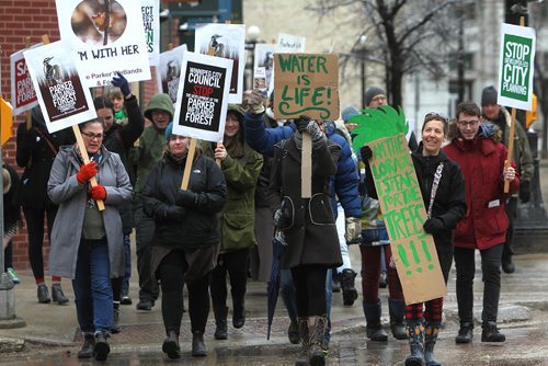 RUTH BONNEVILLE /  WINNIPEG FREE PRESS

Community members hold placards as they walk down Main street in rally to Save Parker Forest and Wetlands on Earth Day Saturday.  


April 22, 2017