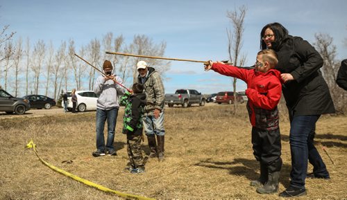MIKE DEAL / WINNIPEG FREE PRESS
Noah Stuve (left), 6, and Johnny Orzech, 6, try out an Atl Atl during the FortWhyte Alive annual Earth Day celebration on Sunday.
170423 - Sunday, April 23, 2017.