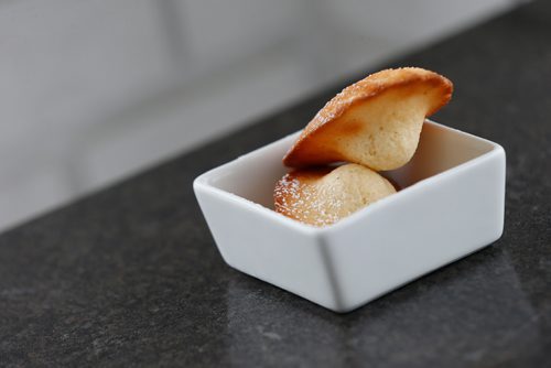 JOHN WOODS / WINNIPEG FREE PRESS
Chef Sophon Chhin's creation "Beurre" - Freshly baked madeleine dusted with powdered sugar is on the menu at Baon's Manila Nights event, Midnight In Paris, the first in their new dessert pop-up series at Sugar Blooms and Cakes Cafe, Sunday, April 23, 2017.