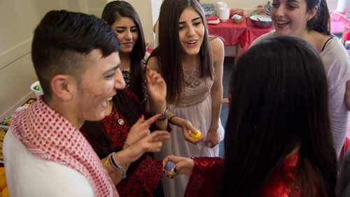 Canstar Community News April 19, 2017 - Members of Winnipeg's Yazidi community celebrate the religious new year at the First Unitiarian Universalist Church with a game featuring coloured, hard boiled eggs that are struck against one another. (DANIELLE DA SIVLA/SOU'WESTER/CANSTAR).