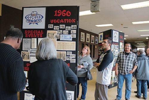 Canstar Community News April 20, 2017 - People look at board with memories of R.B. Russell Vocational High School. (LIGIA BRAIDOTTI/CANSTAR COMMUNITY NEWS/TIMES)