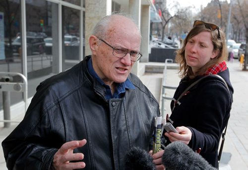 BORIS MINKEVICH / WINNIPEG FREE PRESS
Senior citizen James Aisaican-Chase has terminal cancer and is fighting a red light ticket. He appeared in court this morning. Wise up Winnipeg is using the case to advocate for longer amber lights. Left, James Aisaican-Chase talk to the press outside traffic court at 373 Broadway Avenue. Right is Free Press reporter Jane Gerster. JANE GERSTER STORY. April 26, 2017