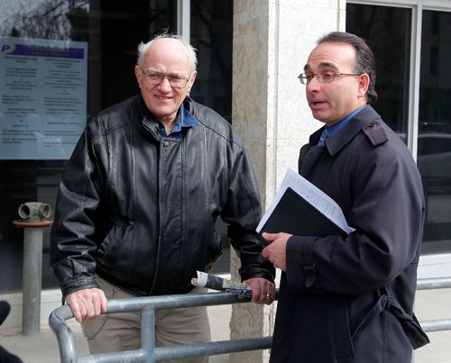 BORIS MINKEVICH / WINNIPEG FREE PRESS
Senior citizen James Aisaican-Chase has terminal cancer and is fighting a red light ticket. He appeared in court this morning. Wise up Winnipeg is using the case to advocate for longer amber lights. From left, James Aisaican-Chase talks to lawyer Frank Conigloi outside traffic court at 373 Broadway Avenue. JANE GERSTER STORY April 26, 2017