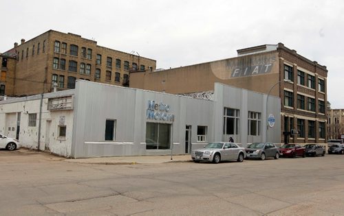 BORIS MINKEVICH / WINNIPEG FREE PRESS
Shoots of the location of a $94 million Red River College Innovation Centre. The location is on Elgin Ave just north of RRCs Princess St. campus. The site includes Metro Motors lot and the building next to it. MARTIN CASH STORY. April 26, 2017