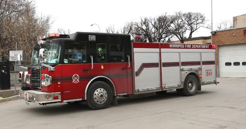 WAYNE GLOWACKI / WINNIPEG FREE PRESS

A fire truck departs the Fire Station #4 on Osborne St.   April 26 2017