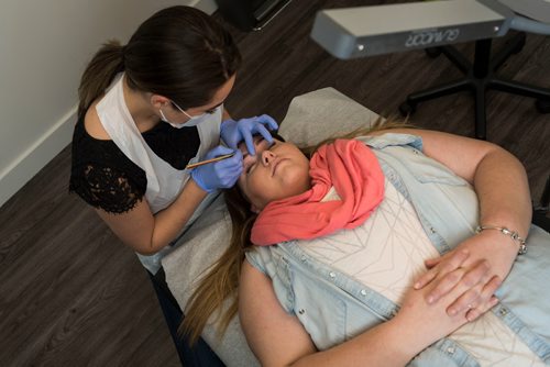 DAVID LIPNOWSKI / WINNIPEG FREE PRESS

Founder and CEO of Brows by G, Giovanna Minenna demonstrating microblading on Angela Chaboyer at her shop on Grant Ave Thursday April 27, 2017. 

