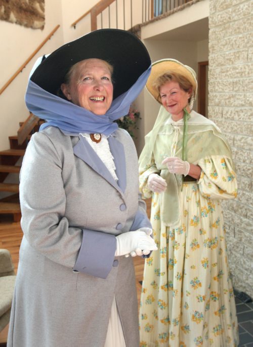 WAYNE GLOWACKI / WINNIPEG FREE PRESS

Volunteers.   Wearing outfits from the Costume Museum of Canada, Margaret Mills,left, in a motoring coat and hat beside Sylvia Shettler, a new volunteer wearing an 1835 replica summer gown and bonnet as they  prepare for Fashion Review.   Margaret has volunteered with the musseum for 30 years.  Aaron Epp story  April 27 2017