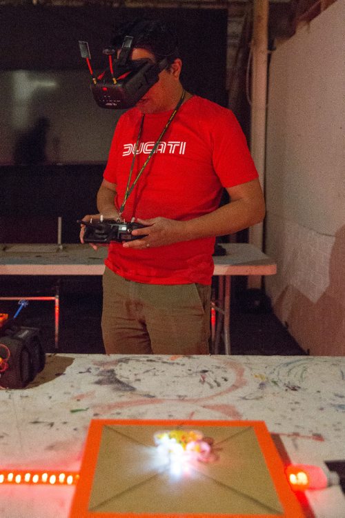 MIKE DEAL / WINNIPEG FREE PRESS
Marlon Evan gets ready to do a practice lap with his micro fpv drone during the first organized indoor drone race at the Graffiti Gallery Sunday afternoon.
170430 - Sunday, April 30, 2017.