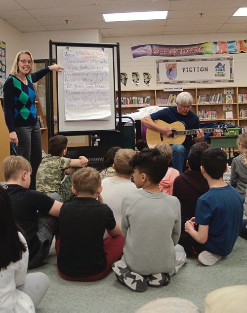 Canstar Community News Grade 4 students at Joseph Teres School (131 Sanford Fleming Rd.) wrote a song for Canada's 150th anniversary with local songwriter Aaron Burnett. Here they are rehearsing the song on April 26 before their big debut on April 28. (SHELDON BIRNIE/CANSTAR COMMUNITY NEWS/THE HERALD)
