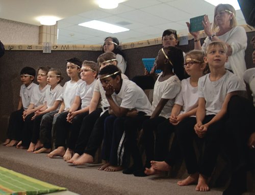 Canstar Community News April 25, 2017 - Students in Sandy Fazenda's Grade 2/3 class at Bernie Wolfe Community School (95 Bournais Dr.) look on, awaiting their turns, while vice-principal Ryan Francis is prepared for "mummification." The group has been learning about ancient Egypt in social studies class. (SHELDON BIRNIE/CANSTAR/THE HERALD)