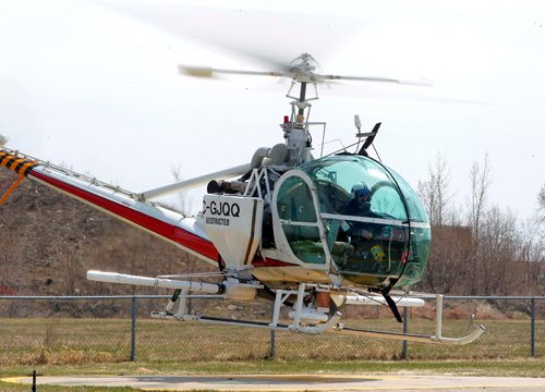 BORIS MINKEVICH / WINNIPEG FREE PRESS
The insect control helicopter does some demonstration flying for the media after the press conference about mosquito season. Photo taken at the insect Control Branch Heliport  620 Tyne Avenue. FILE PHOTOS. ALDO SANTIN STORY. May 1, 2017