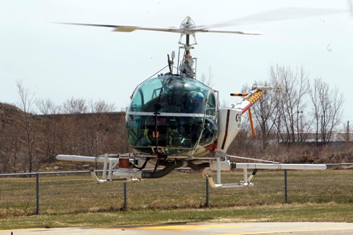BORIS MINKEVICH / WINNIPEG FREE PRESS
The insect control helicopter does some demonstration flying for the media after the press conference about mosquito season. Photo taken at the insect Control Branch Heliport  620 Tyne Avenue. FILE PHOTOS. ALDO SANTIN STORY. May 1, 2017